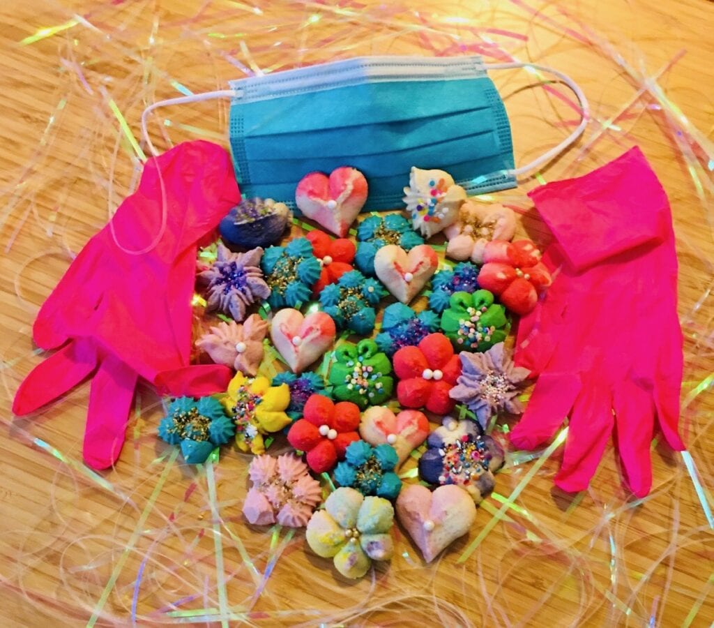 A table topped with colorful candies and gloves.