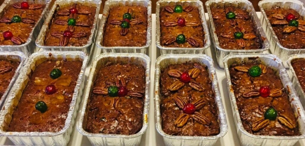 A tray of pecan pie is lined up in rows.