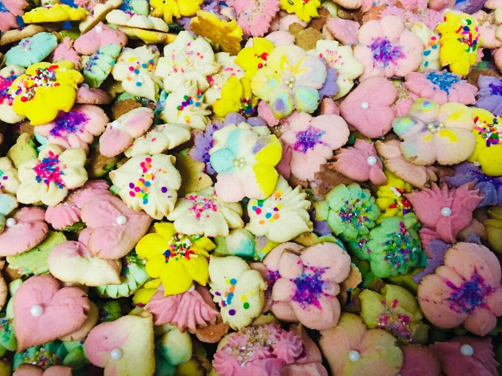 A bunch of cookies that are all different colors