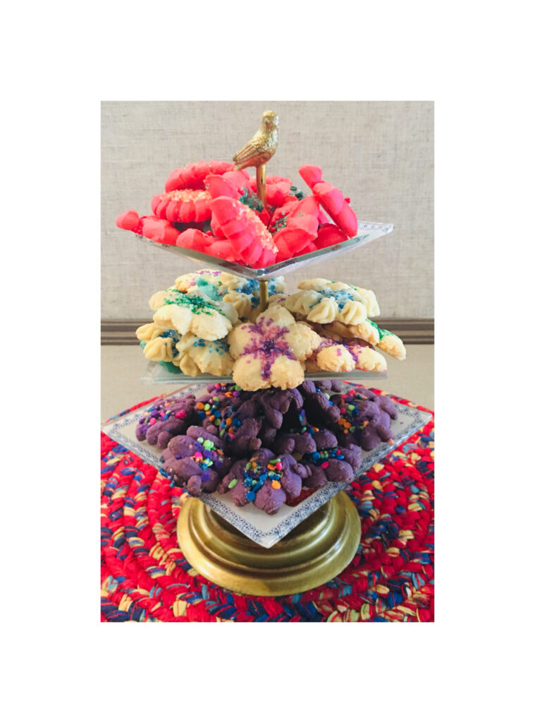 A tower of cookies on top of a table.